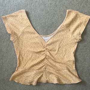 American Eagle Yellow baby tee